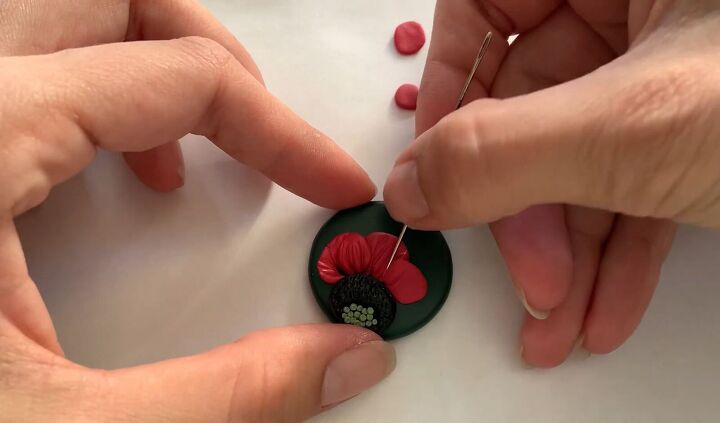 how to make a beautiful poppy polymer clay pendant in 9 simple steps, Adding the poppy petals to the pendant