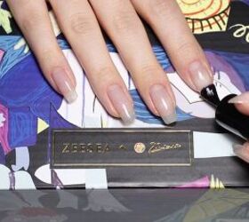 how to put a spin on a classic manicure using a fun french tip hack, Applying a base coat to nails