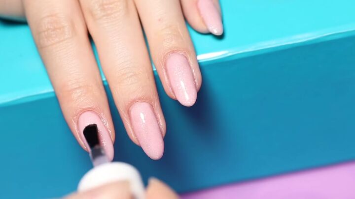 how to do gorgeous baby boomer nails step by step at home, Applying a matte gel top coat to nails