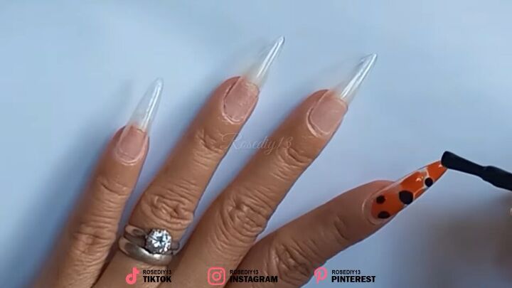 how to create unique look nail art using the cling wrap nail trick, Applying dots of colored nail polish