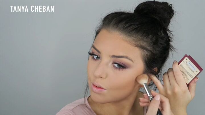 how to do a purple smokey eye for a glam spring summer look, Contouring cheekbones with bronzer