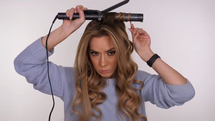 how to curl hair perfectly with a curling iron step by step, Curling the top section of hair with a curling iron