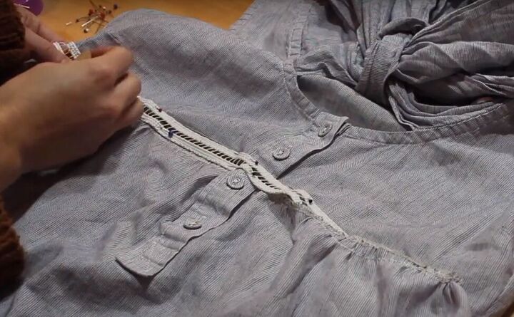 how to quickly easily refashion a top in 5 simple steps, Pinning the serged edge of the top