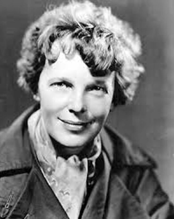 how to tie an ascot scarf in 3 different stylish ways, Amelia Earhart wearing an ascot scarf