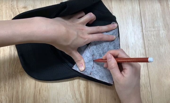 how to make a baseball cap out of an old pair of denim jeans, Tracing the cap openings