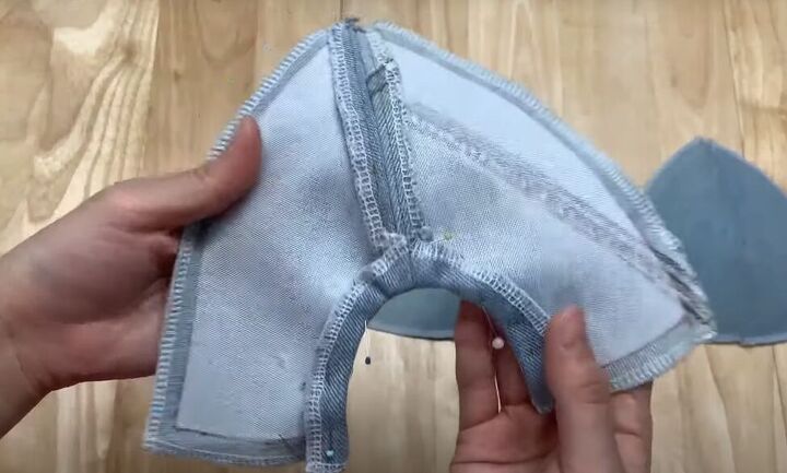 how to make a baseball cap out of an old pair of denim jeans, Snipping into the seam allowance
