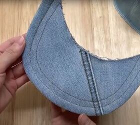 how to make a baseball cap out of an old pair of denim jeans, Snipping the seam allowance