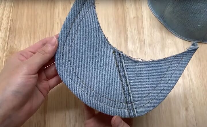 how to make a baseball cap out of an old pair of denim jeans, Snipping the seam allowance