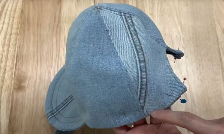 how to make a baseball cap out of an old pair of denim jeans, Turning the facing into the cap