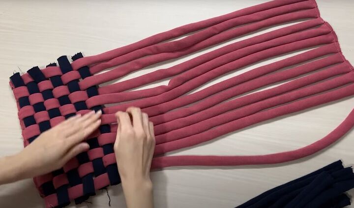 how to make a bag from t shirts that is cute truly unique, Weaving the shirt and long strips together