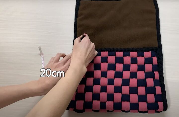 how to make a bag from t shirts that is cute truly unique, Folding the fabric to make a purse