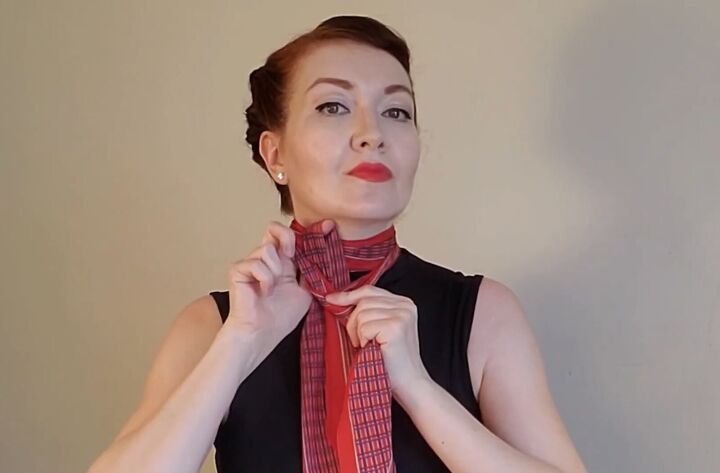 6 elegant audrey hepburn scarf styles how to wear them, Tying a knot in the scarf
