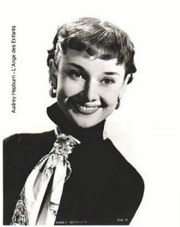 6 elegant audrey hepburn scarf styles how to wear them, Audrey Hepburn scarf tie
