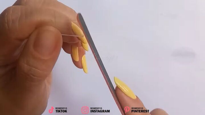 how to make fake nails at home with a plastic bottle, Filing the sharp edges of the fake nail