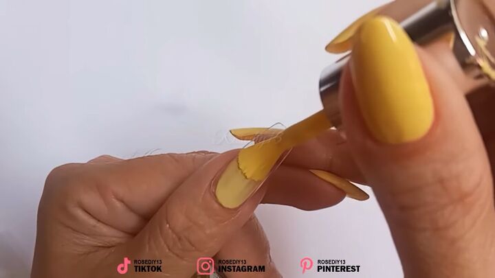 how to make fake nails at home with a plastic bottle, Applying yellow nail polish to the fake nail