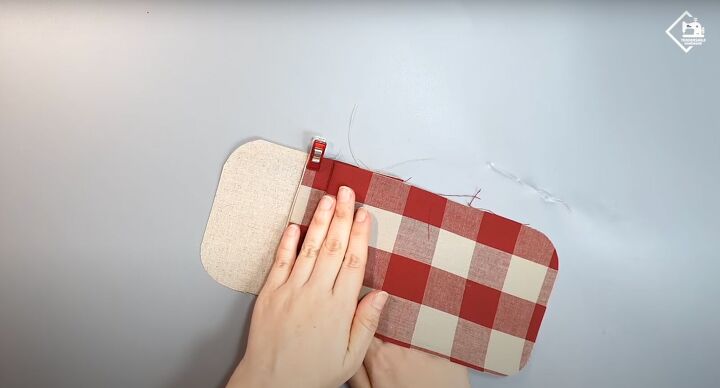 how to sew a cute practical diy card wallet from scratch, Folding the fabric to make the second pocket