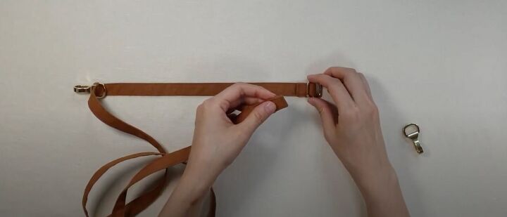 how to easily make a diy crossbody strap for a bag or purse, Inserting the slide buckle on the other hand