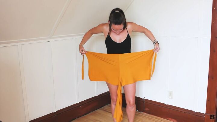 how to make a multi way wrap that can be a top shorts or skirt, Lining up the DIY wrap at the waist