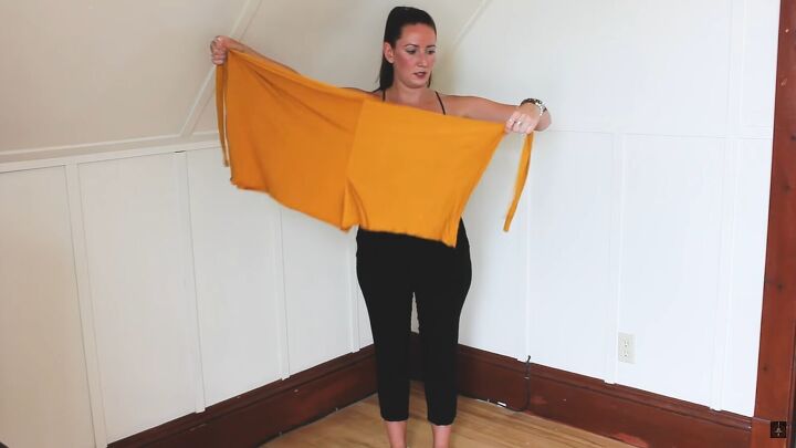 how to make a multi way wrap that can be a top shorts or skirt, Folding the DIY wrap in half