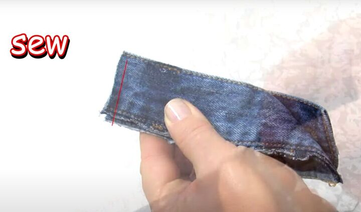 how to make a diy denim bracelet with a cute flower design, Sewing the short ends together
