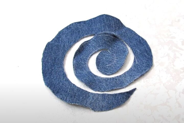 how to make a diy denim bracelet with a cute flower design, Cutting out the spiral shape