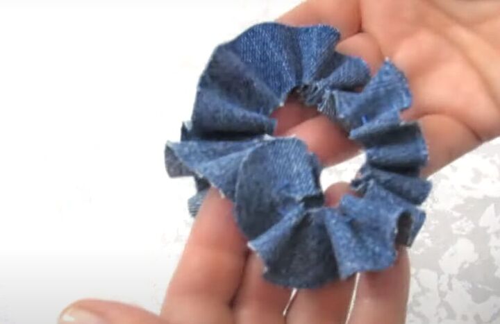 how to make a diy denim bracelet with a cute flower design, Sewing a basting stitch to gather the denim
