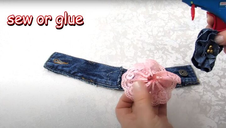 how to make a diy denim bracelet with a cute flower design, How to make denim cuff bracelets out of old jeans