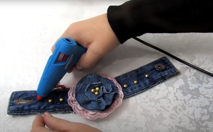 how to make a diy denim bracelet with a cute flower design, How to make a denim wrap bracelet and decorate it