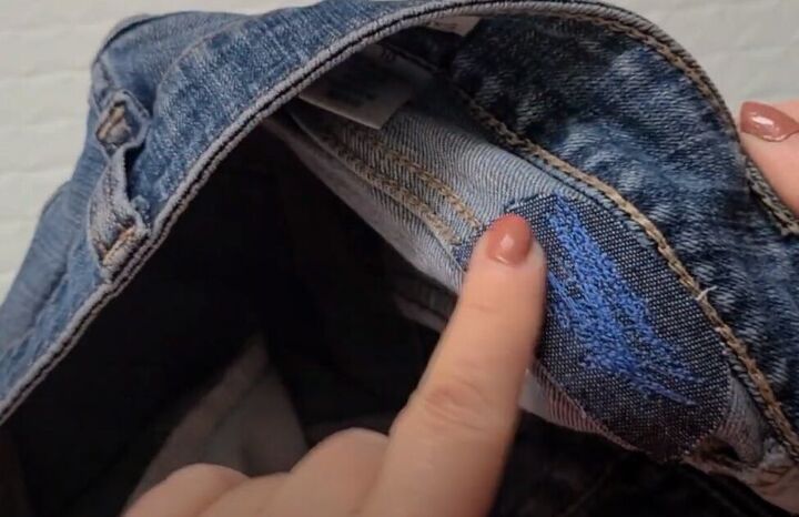 how to fix a belt loop on jeans in 6 quick easy steps, Sewing over the denim patch