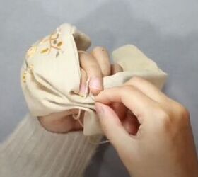 how to make a cute diy knotted headband with embroidery, Pinching the fabric in the middle
