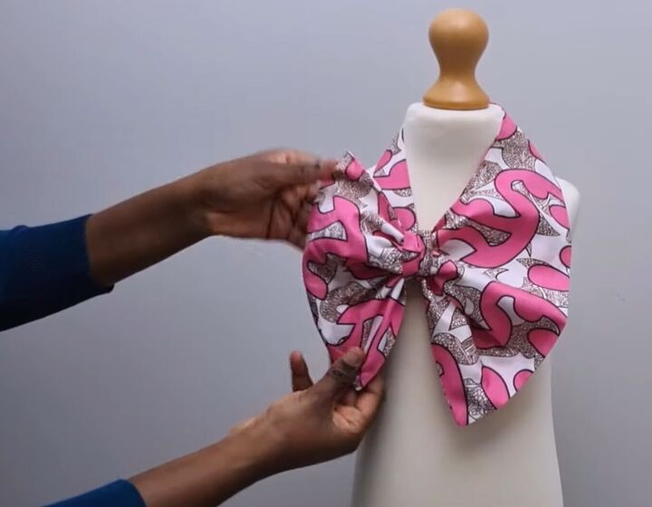 how to make a classic french scarf from pattern drafting to sewing, Tying the French knot scarf into a bow