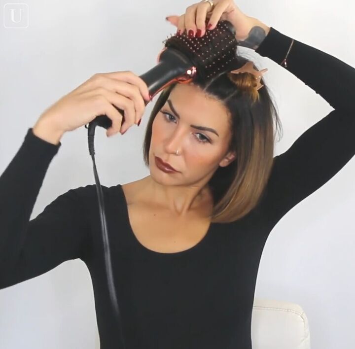 5 pro hairdresser secrets on how to make hair look fuller thicker, Using the cool shot button to set hair