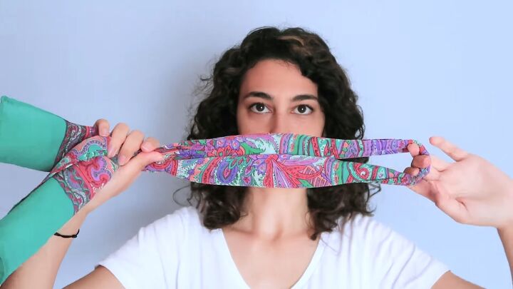 how to braid a scarf into hair for a quick easy summer hairstyle, Folding the scarf in half