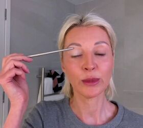 how to do easy flattering hooded eye makeup over 50, Applying a light base color eyeshadow