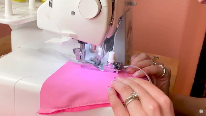 how to make a wrap bikini top with a unique asymmetrical design, Sewing the DIY bikini top with an overlock machine