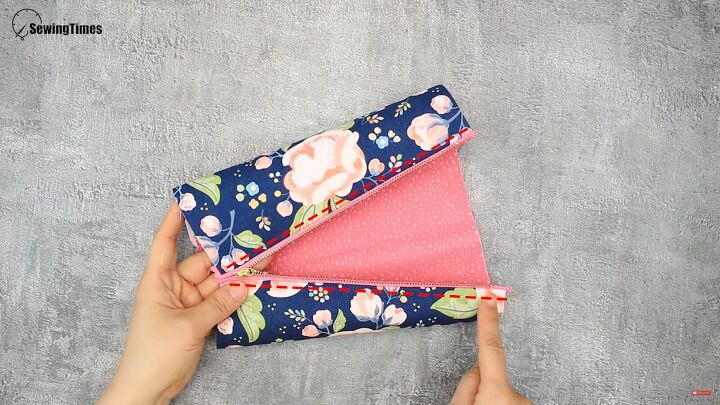 how to sew a cute diy cosmetic bag for carrying makeup, Topstitching along the zipper