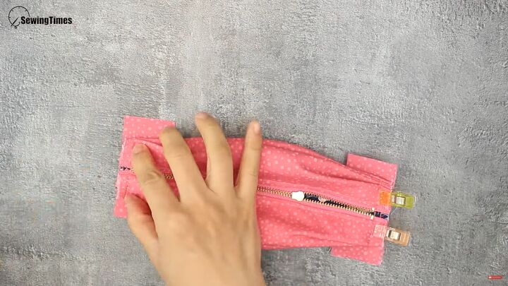 how to sew a cute diy cosmetic bag for carrying makeup, Pinning the end pieces of fabric
