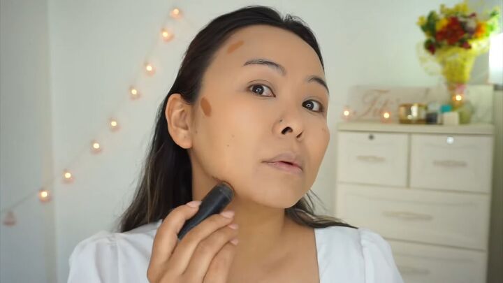 how to create a fresh dewy bright spring makeup look, Applying contour to the sides of the face