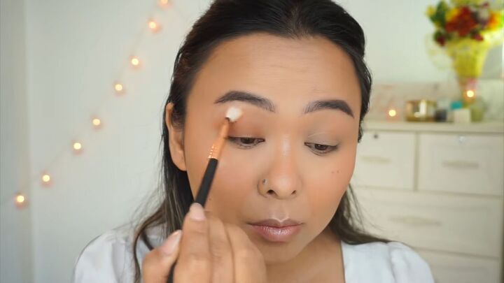 how to create a fresh dewy bright spring makeup look, Applying a matte brown eyeshadow