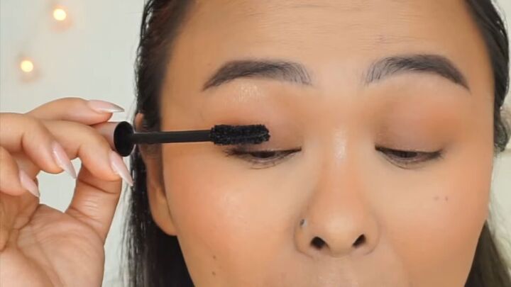 how to create a fresh dewy bright spring makeup look, Defining lashes with a light coat of mascara