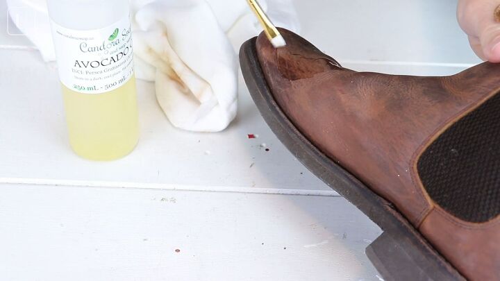 how to restore leather boots at home in 6 simple steps, Applying avocado oil to the leather boots