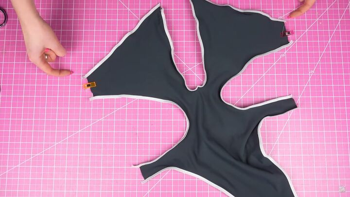 how to make your own swimsuit with a sexy cutout keyhole design, Clipping the open bust areas closed