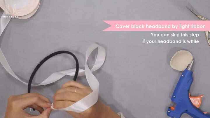 how to make a cute diy scrunchie headband with linen fabric, Gluing white ribbon to the headband