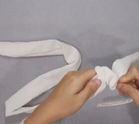how to make a cute diy scrunchie headband with linen fabric, Scrunching the white linen fabric