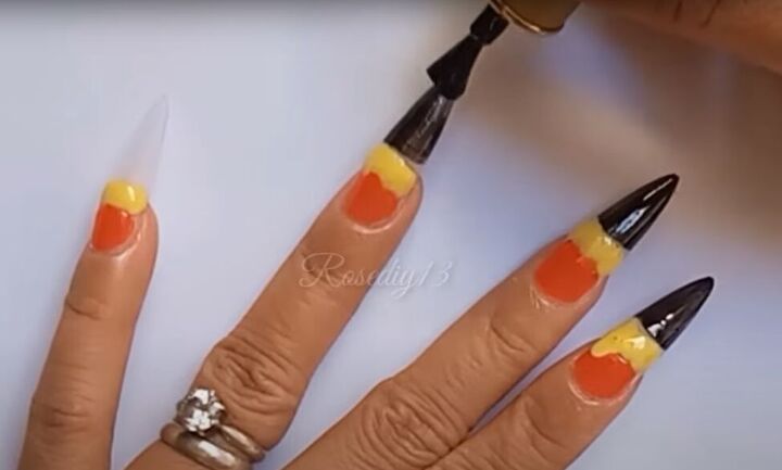how to do easy diy gel nail art in fiery orange yellow black, Applying black gel nail polish