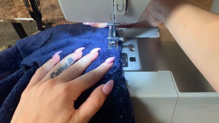 how to make fuzzy cozy pajamas out of a 16 walmart blanket, Sewing the pockets