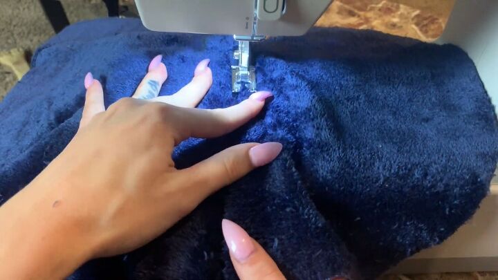 how to make fuzzy cozy pajamas out of a 16 walmart blanket, Topstitching the pockets