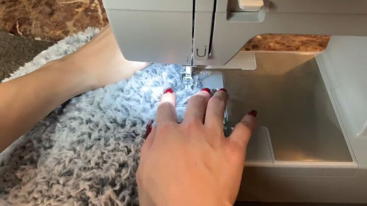 how to sew a hoodie out of a fluffy sherpa blanket from walmart, Sewing the sleeves