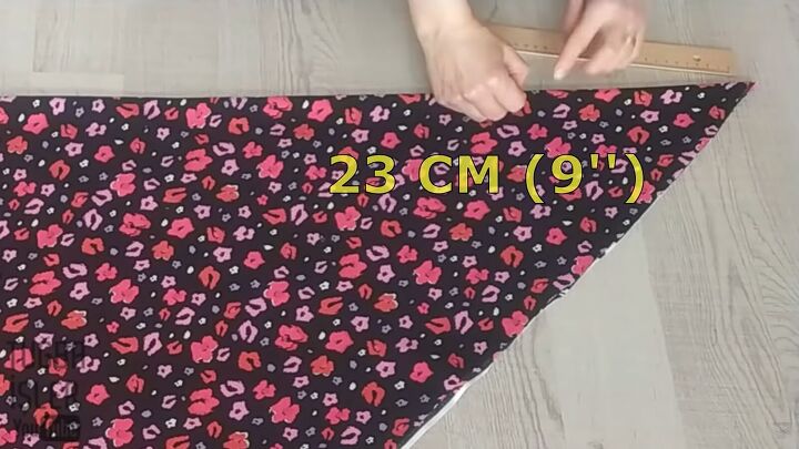 how to sew an a line dress without a pattern in 4 simple steps, Measuring 9 inches inwards