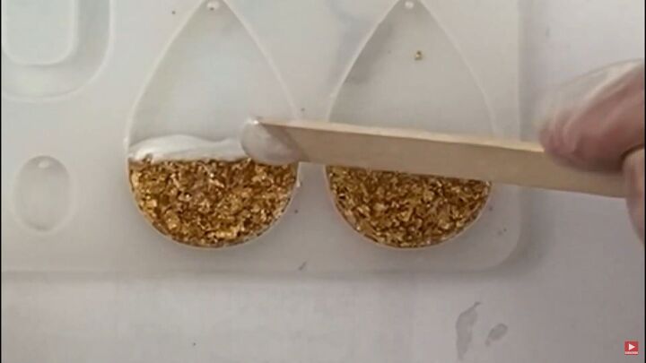 how to make pretty resin ocean wave earrings with gold foil, Placing the white resin on top of the gold
